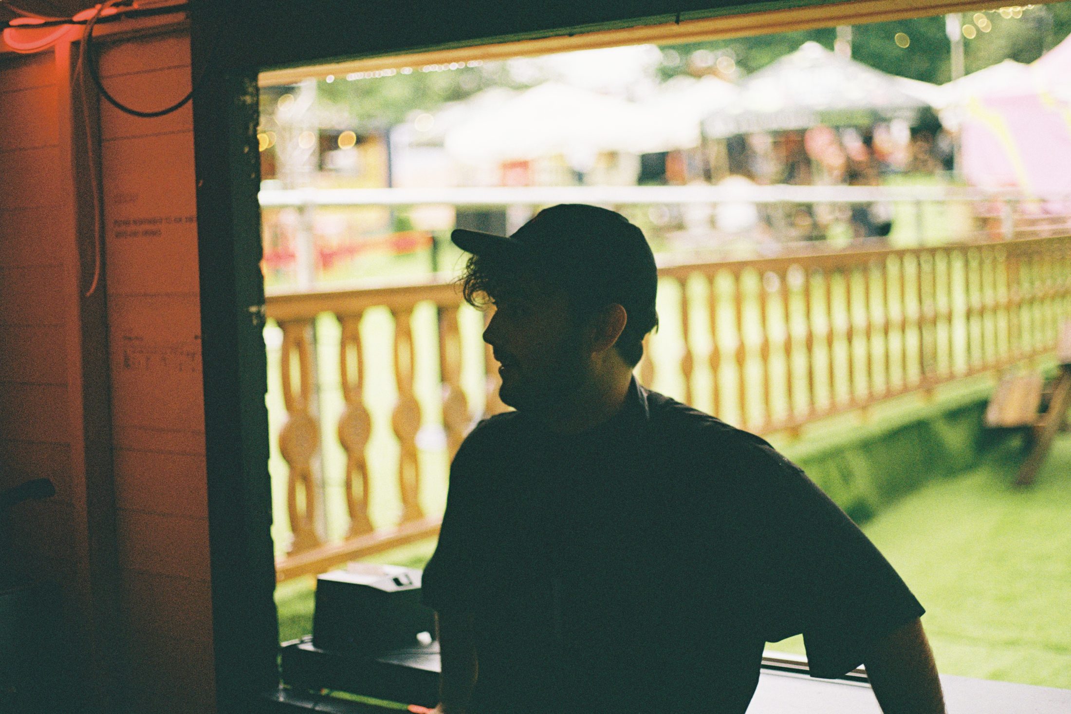 A COOP staff member in the serving window at Assembly George Square